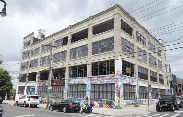 The large, four-story loft-style office building at 49 Wyckoff Avenue in Bushwick, Brooklyn.