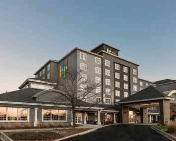 A $20.7 million loan secured by the IHG-flagged EVEN Hotel Chicago – Tinley Park (pictured) returned to the master servicer in December after initially transferring to special servicing in October 2021.