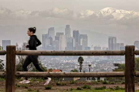 A woman enjoys a gloomy day at Kenneth Hahn State Recreation Area on Jan. 2 in Los Angeles.