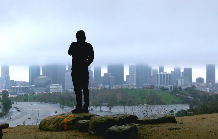 Rain clouds shroud the skyline of Downtown Los Angeles in January 2023, a harbinger for the national multifamily market.