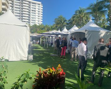 CREFC conference attendees in the cabana area of the Loews Miami Beach Hotel Monday.
