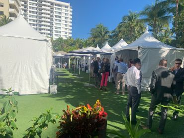 CREFC conference attendees in the cabana area of the Loews Miami Beach Hotel Monday. 