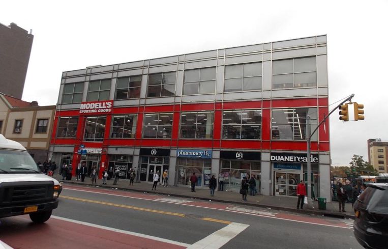 The three-story building at 135 East 125th Street.