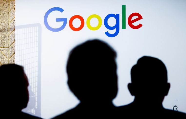 Google logo is seen during the reopening of Google office in 2022.