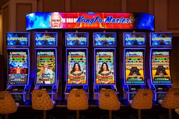 A bank of Kung Fu Master video slot machines at the Venetian Hotel Casino.