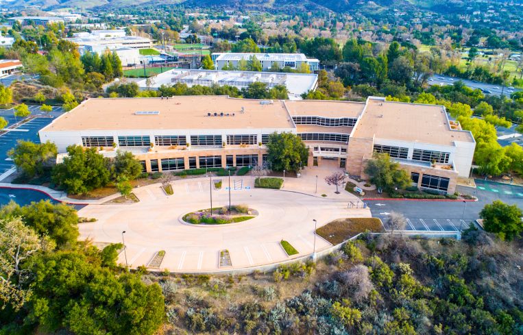 The existing two-story office building was completed in 1998 on 6.7 acres at 120 South Via Merida Way.