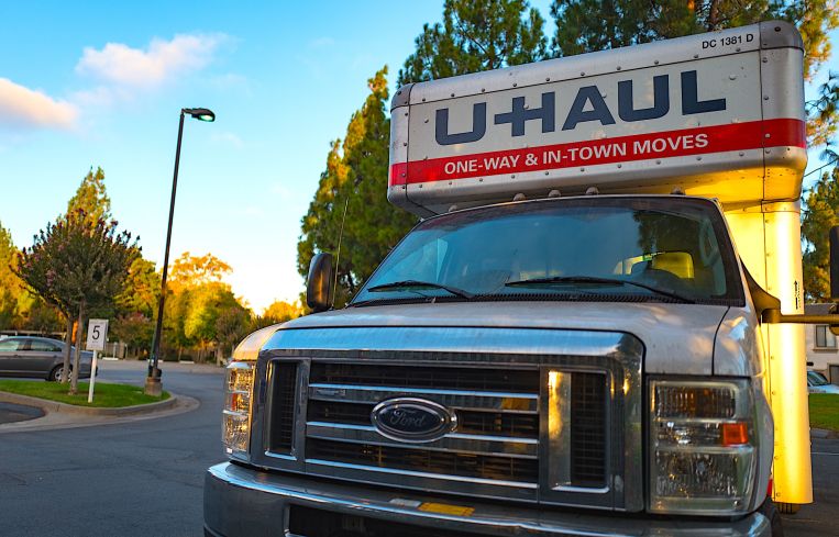 U-Haul moving truck in the parking lot of an apartment complex in the San Francisco Bay Area.