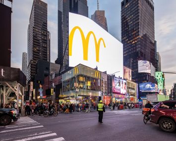 The current retail and tourism environment in Times Square includes McDonalds located at 1651 Broadway.