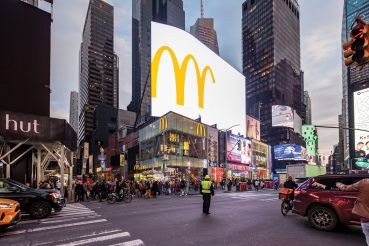 The current retail and tourism environment in Times Square includes McDonalds located at 1651 Broadway.