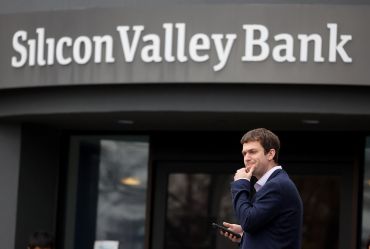 A customer stands outside a Silicon Valley Bank brach.