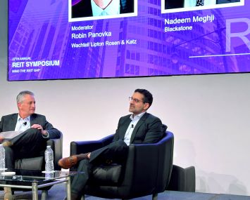 NADEEM MEGHJI (RIGHT), HEAD OF BLACKSTONE REAL ESTATE – AMERICAS, SPEAKS AT THE 27TH ANNUAL REIT SYMPOSIUM HOSTED BY NYU'S SCHACK INSTITUTE OF REAL ESTATE IN A DISCUSSION MODERATED BY ROBIN PANOVKA, PARTNER AT WACHTELL LIPTON ROSEN & KATZ.