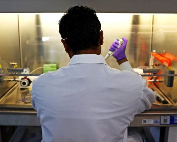 Scientist Thareendra DeZoysa working in a lab. A look inside SQZ Biotechnologies, in Arsenal Yards Watertown, MA.