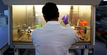 Scientist Thareendra DeZoysa working in a lab. A look inside SQZ Biotechnologies, in Arsenal Yards Watertown, MA.
