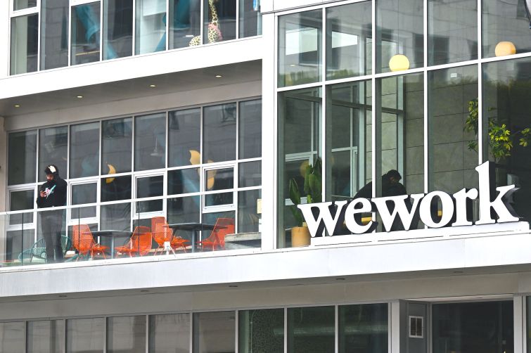 The WeWork logo outside of an office space rental location in Santa Monica, Calif., on March 20.