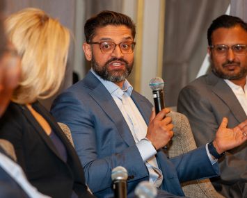 Neil Gupta, chief investment officer and executive vice president at Rudin Management Company, holds court with Lauren Hochfelder of Morgan Stanley and Niraj Shah of Rockwood Capital during the 2023 Spring Finance Forum.