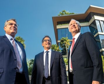 3650 REIT founers (from left): Justin Kennedy, Jonathan Roth, and Toby Cobb at their Miami offices.