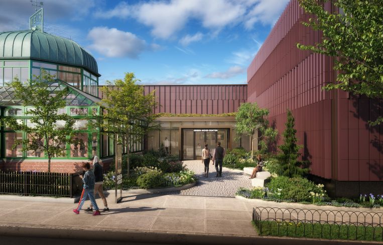 The new structure, designed by Architecture Research Office, includes terra cotta and glass panels to allow visitors to look out on the greenhouse and the cemetery.