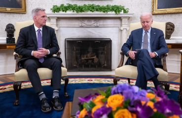 US President Joe Biden meets with US House Speaker Kevin McCarthy (R-CA) (L) about the debt ceiling, in the Oval Office of the White House in Washington, DC, on May 22, 2023.