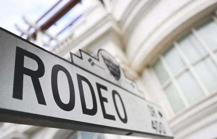 A Rodeo Drive street sign stands on the corner of the site of the proposed Cheval Blanc Hotel from LVMH Moet Hennessy Louis Vuitton on Rodeo Drive in Beverly Hills, California, on May 23, 2023. LVMH headed by Bernard Arnault, the world's largest fortune, had chosen Beverly Hills, the wealthy neighbor of Los Angeles, to establish its Cheval Blanc brand in the United States, which has five luxury hotels, including in Paris, Courchevel and Saint-Barth. Beverly Hills residents voted May 23 on two proposals to allow or block the luxury hotel project in the current form Referendums B and C.