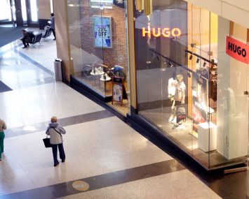 Customers walk through a shopping mall on March 15, 2023 in Chicago.