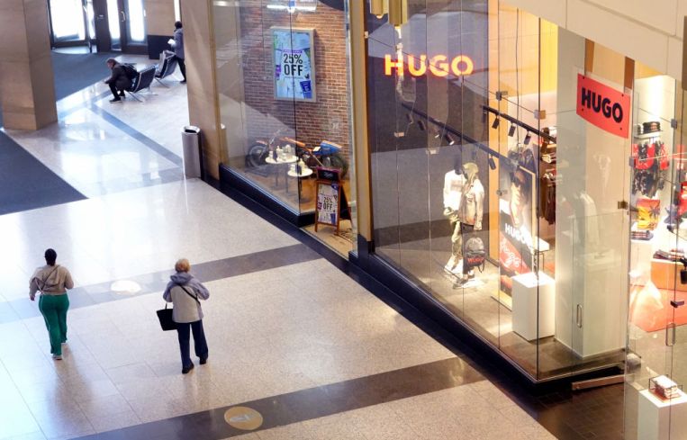 Customers walk through a shopping mall on March 15, 2023 in Chicago.