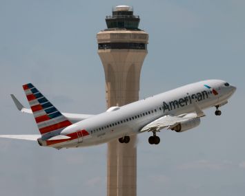 An American Airlines plane takes off from the Miami International Airport.