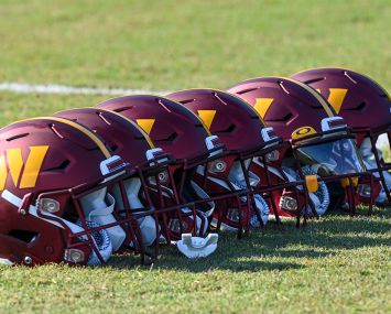 Washington Commanders helmets on the field