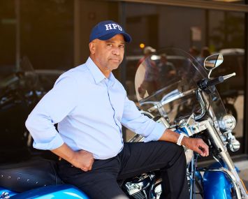 Adolfo Carrión Jr. on his motorcycle outside of HPD's office at 100 Gold Street in Manhattan.