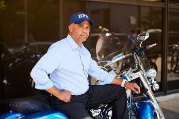Adolfo Carrión Jr. on his motorcycle outside of HPD's office at 100 Gold Street in Manhattan. 