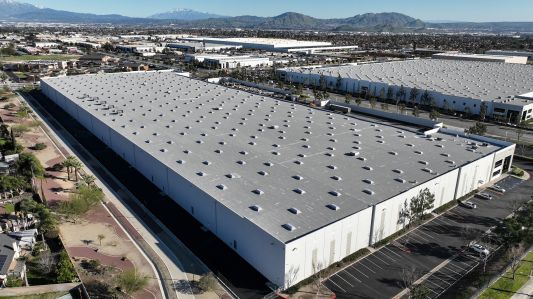 New warehouse development in Southern California’s Inland Empire next to Rialto Middle School.