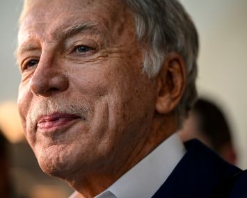 Los Angeles Rams, Colorado Avalanche, Denver Nuggets, and Arsenal FC owner Stan Kroenke speaks during an NFL special league meeting in August 2022.