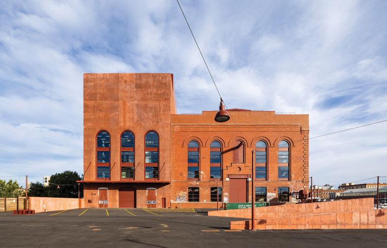 The building's exterior was landmarked during construction and painstakingly repointed. A new building was also constructed next door.