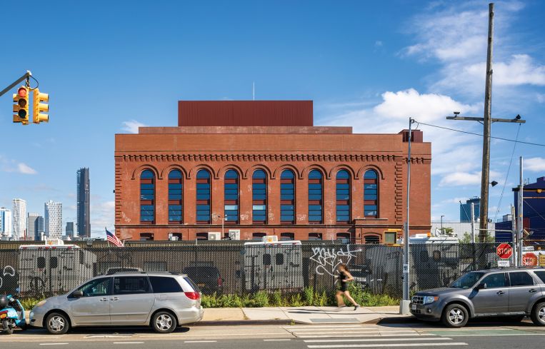 Design architects Herzog & de Meuron wanted to preserve as much of the building's aesthetic as possible, though much of the iconic graffiti on the building's exterior was lost when the brick was repointed.