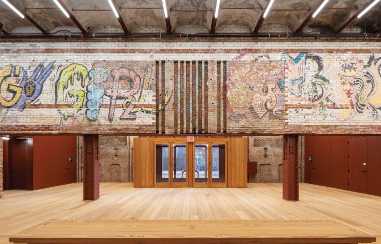 The lobby includes a mural that was painstakingly disassembled and re-assembled during construction.