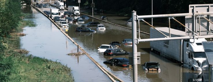 Cars sit abandoned on the flooded Major Deegan Expressway in the Bronx