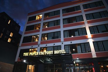 An exterior view of the Paper Factory Hotel in Long Island City, New York
