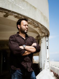 A man standing in a windosill