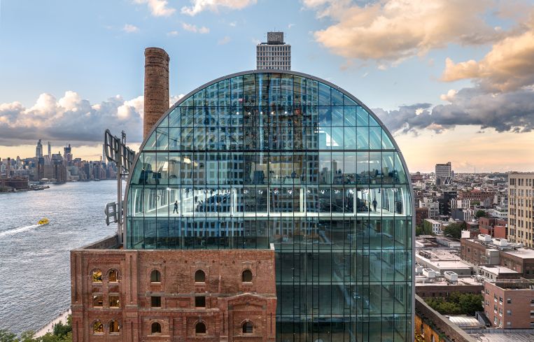 The existing refinery was eight to nine stories, while the new, glass-domed building is 15 stories.