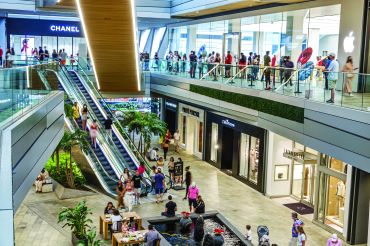 Miami, Florida, Brickell City Centre shopping mall with Apple Store, Chanel and escalators. 