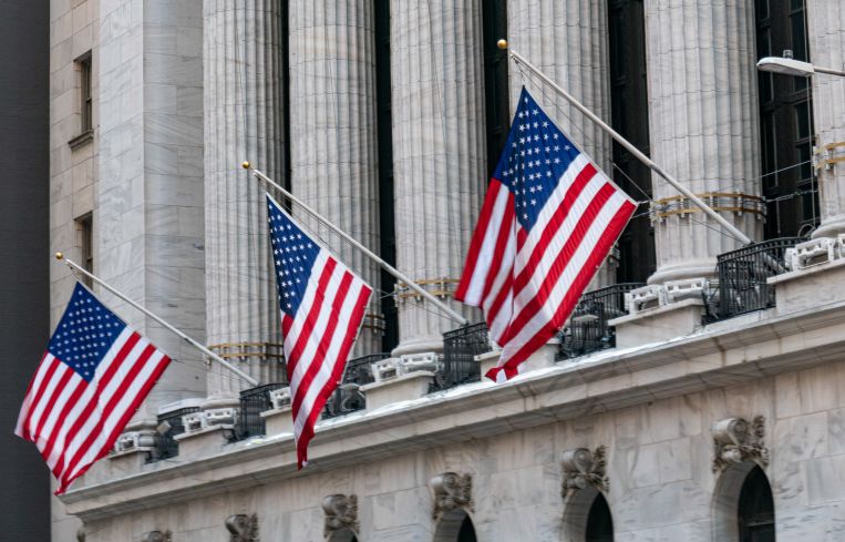 30 Broad Street sits next to the New York Stock Exchange (pictured)