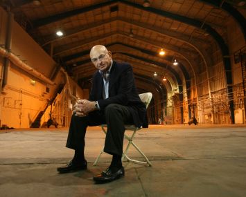 Developer Wayne Ratkovich in 2010 pose in the former Howard Hughes hangars that he bought in Playa Vista. The Ratkovich Company has since redeveloped the site, and its main tenant today is Google.