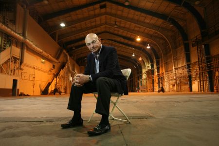 Developer Wayne Ratkovich in 2010 pose in the former Howard Hughes hangars that he bought in Playa Vista. The Ratkovich Company has since redeveloped the site, and its main tenant today is Google.