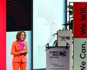 Helen Clarkson on stage at climate week