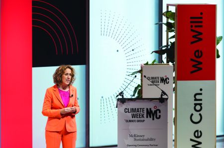 Helen Clarkson on stage at climate week