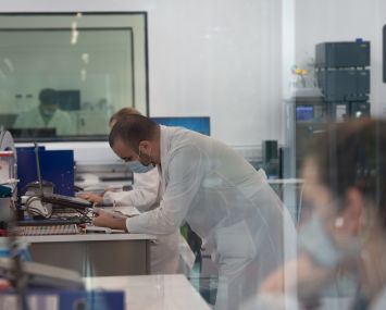 Pharmaceutical employees work in quality control.