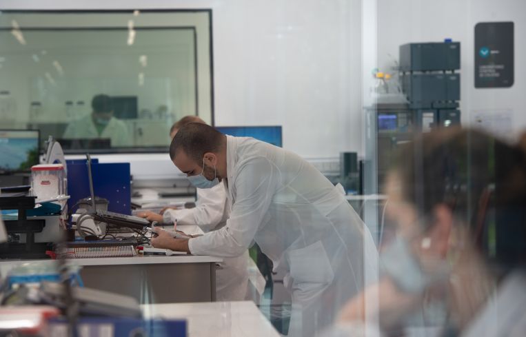Pharmaceutical employees work in quality control.