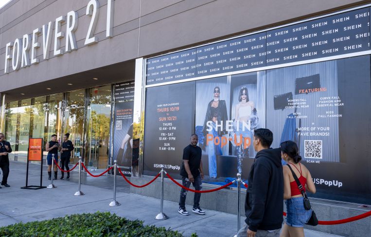 Shoppers begin to line up outside Forever 21 at Ontario Mills mall