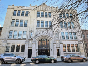 The 46-unit apartment building at 180 Bainbridge Street was formerly Holary Rosary Catholic School. 