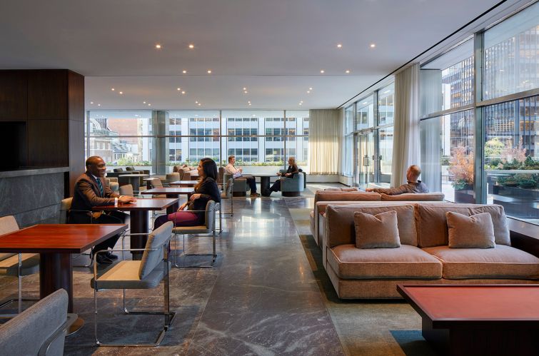 The third floor lounge for tenants features a bar—operated by Casa Lever's restaurant group—and plenty of midcentury couches and armchairs.