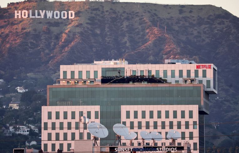 Netflix offices and Sunset Bronson Studios (both owned by HPP) are seen in front of the Hollywood in Los Angeles.